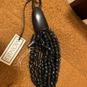 Fabulous Vintage Monies bracelet. Detailed knott and toggle double Labled